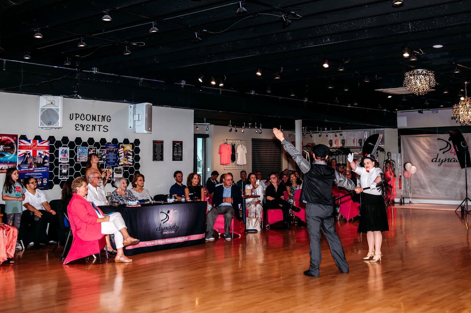 A Dynasty Stars dancer performing for guests